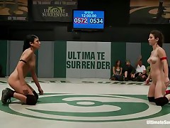 The match is intense and it seems that the referee is looking somewhere else because things are going wild in the arena. These bitches don't know the meaning of fair play and a girl comes in the help of the other one. Looks like someone will need to surrender